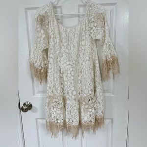 Beautiful white lace dress. Never worn